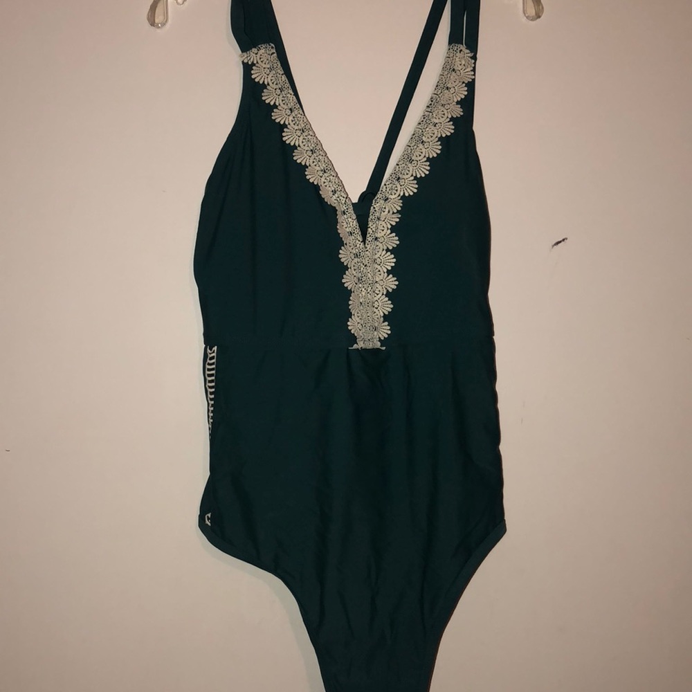 Teal green and white one piece bathing suit